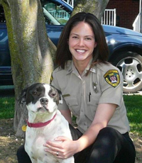 image of animal control officer and dog